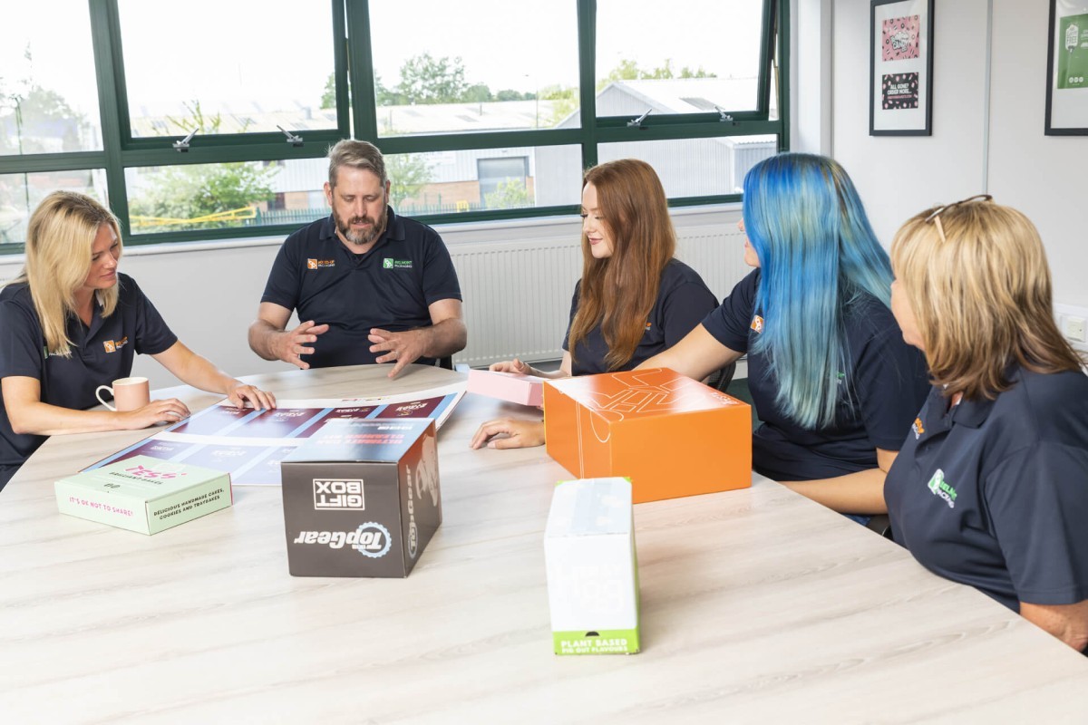 14706 The Team Discussing Packaging In The Boardroom